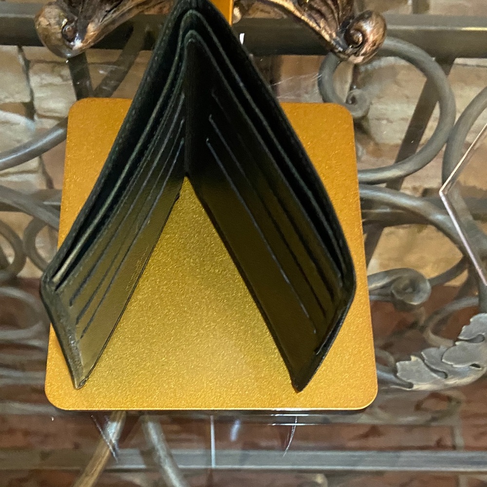 Louis Vuitton Textured Black Wallet - Picture 10 of 10